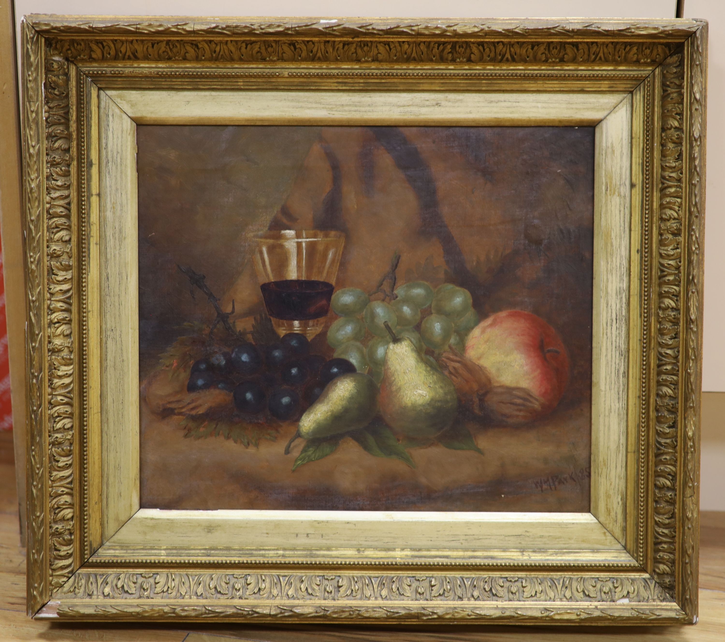 W M Park (19th C), Oil on canvas, still life of fruit and a glass of wine, signed and dated 85, 29 x 34 cm.